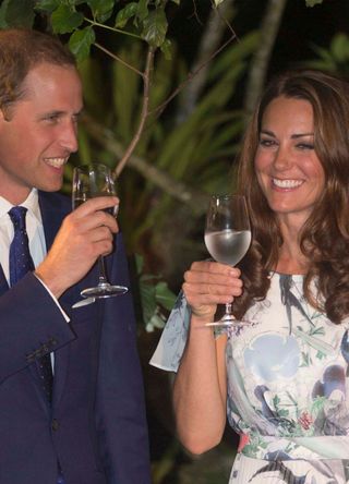 Kate Middleton with a glass in her hand