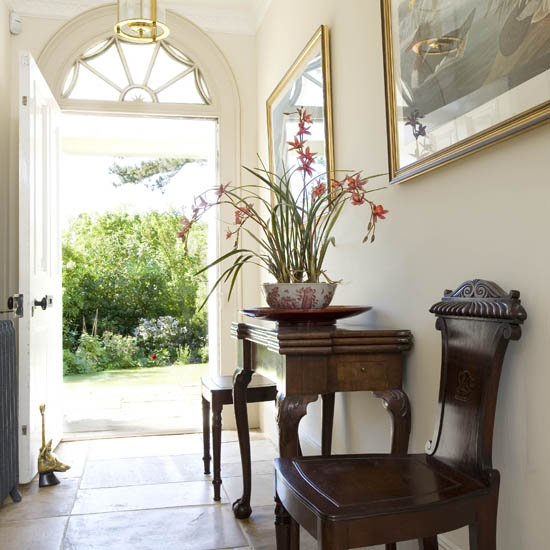 entrance hall with wooden chair and table