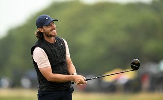 Tommy Fleetwood hits a mini driver at The Open
