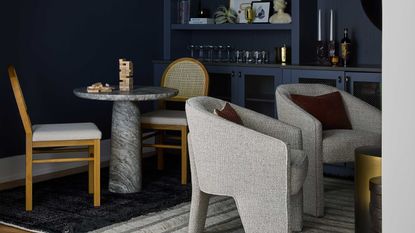 a room painted dark navy blue