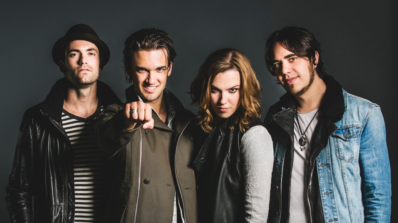 The band Halestorm standing in a line