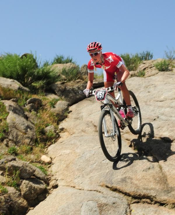 Lene Byberg (Specialized) on a very steep technical descent.