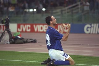 Salvatore Schillaci of Italy celebrates as he scores a goal during the World Cup Quarter Final match against the Republic of Ireland in Rome. Italy won the match 1-0.