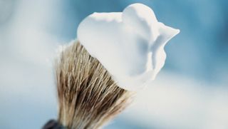 Shaving cream on a brush.