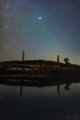 The Andromeda galaxy rises over Achada do Gamo in the Dark Sky Alqueva Reserve near Mértola, Portugal.