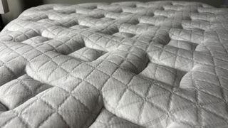 A close-up shot of the Helix Sunset Luxe's pillow top.