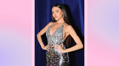 Madison Beer pictured wearing a silver dress while onstage during amfAR Gala Los Angeles 2022 at Pacific Design Center on November 03, 2022 in West Hollywood, California./ in a pink and lilac template
