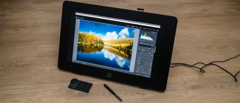 XPPen Artist Pro 24 (Gen 2) 4K drawing tablet on a wooden surface