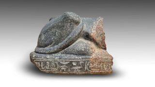 The heads of the pharaohs were part of sphinxes. This shows a fragment of the bottom of a sphinx.