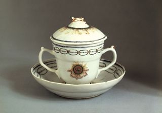 This cup and saucer, tailor-made for first lady Martha Washington, were part of a full Chinese porcelain service set brought back from China's Forbidden City by an American named Houckgeest.