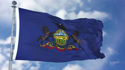 Pennsylvania state flag flying for Pennsylvania state tax guide