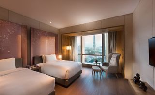 The twin deluxe rooms boast stunning views of the gardens, and 400-thread-count sheets with a choice of pillow