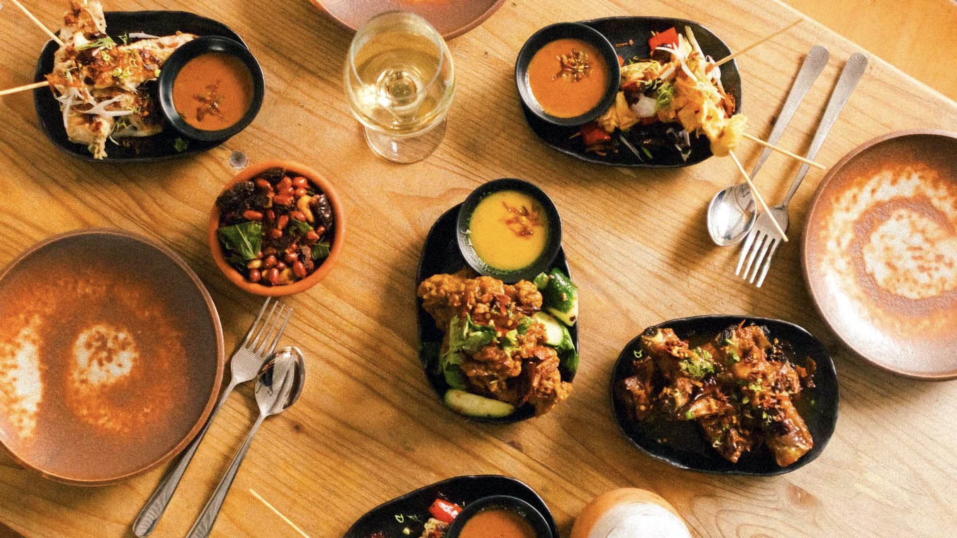 A photo of dishes from Thai restaurant Kruk.