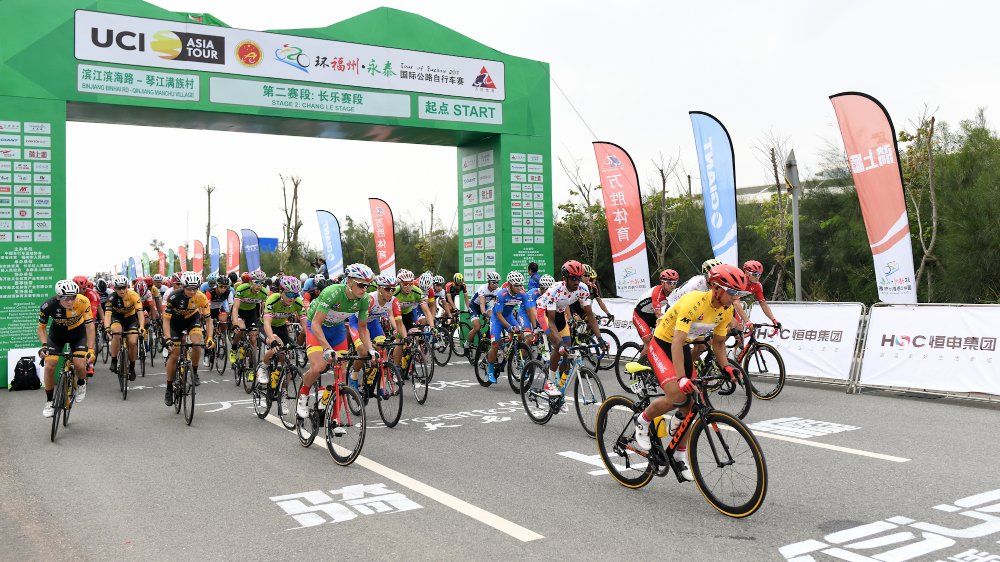 The riders start stage 2