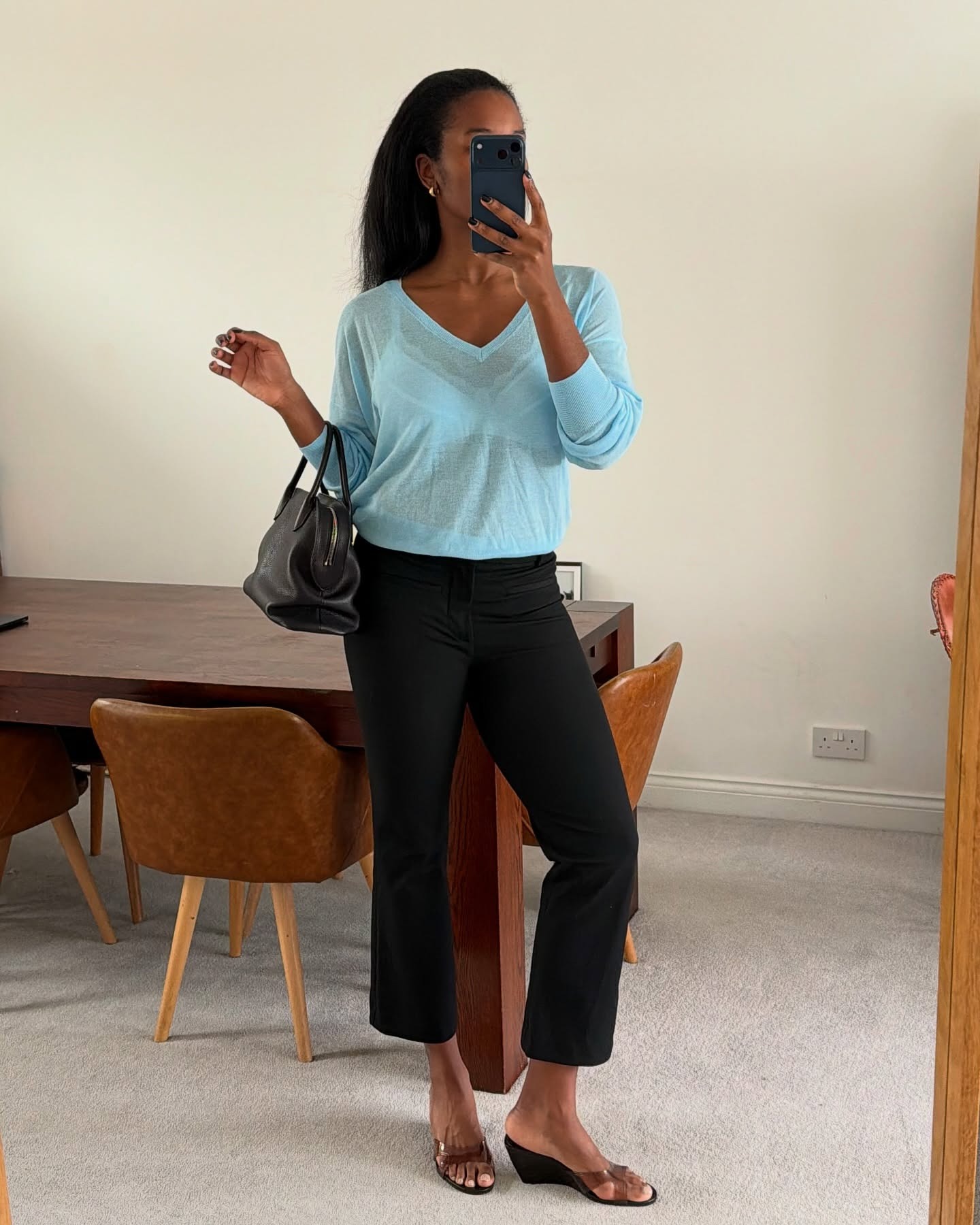 Fashion influencer wearing cropped flares