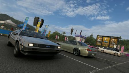 Forza Horizon 6 Hokubu Evolving World Car Meet photo showing DeLorean and Nissan Silvia parked
