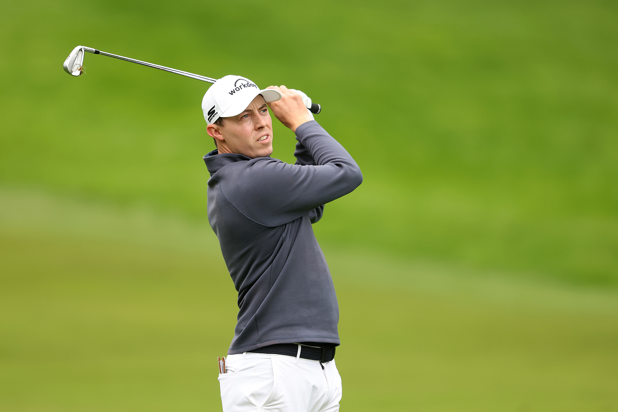 Matt Fitzpatrick in the finish position with an iron