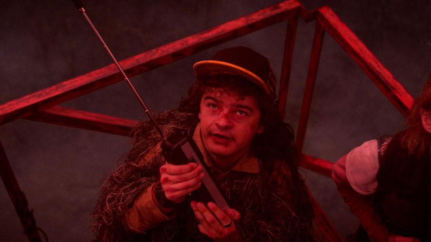 Gaten Matarazzo as Dustin in Stranger Things season 5 episode 8, holding a walkie talkie