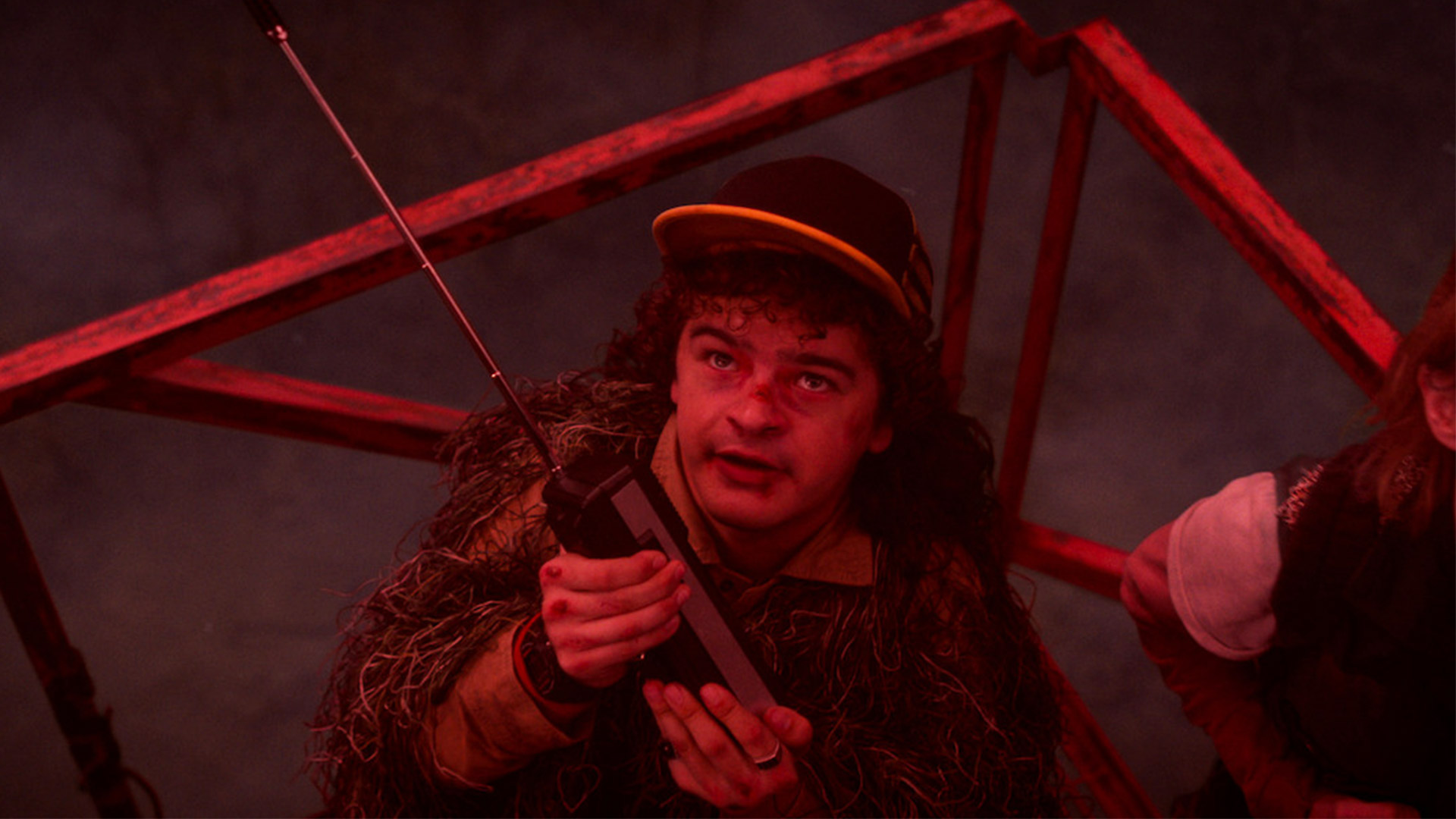 Gaten Matarazzo as Dustin in Stranger Things season 5 episode 8, holding a walkie talkie