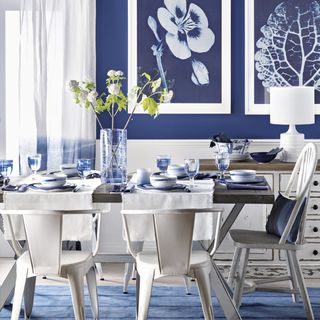 dining area with white dining table set