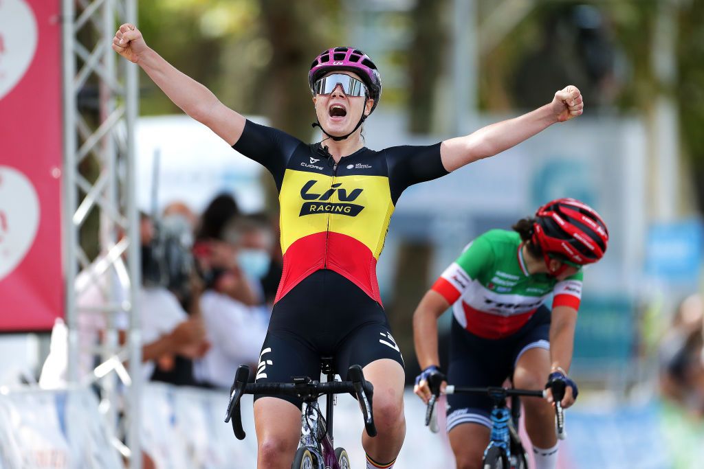 Lotte Kopecky of Belgium and Team Liv Racing celebrates winning ahead of Elisa Longo Borghini of Italy and Team Trek Segafredo during the 7th Ceratizit Challenge By La Vuelta 2021 Stage 4