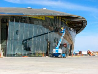 At New Mexico’s Spaceport America, the planned home port of Virgin Galactic's SpaceShipTwo fleet for suborbital space tourist flights, work is nearing completion on the facility's Terminal Hangar.