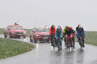 From L Alessandro De Marchi BMC Racing Paolo Tiralongo Astana Nicolas Edet Cofidis and Jeremy Roy FDJ part of an eightmen leading group ride through the snow during the 102nd edition of the LiegeBastogneLiege one day cycling race Sunday 24 April 2016 in Liege AFP Belga DIRK WAEM Belgium OUT Photo credit should read DIRK WAEMAFP via Getty Images