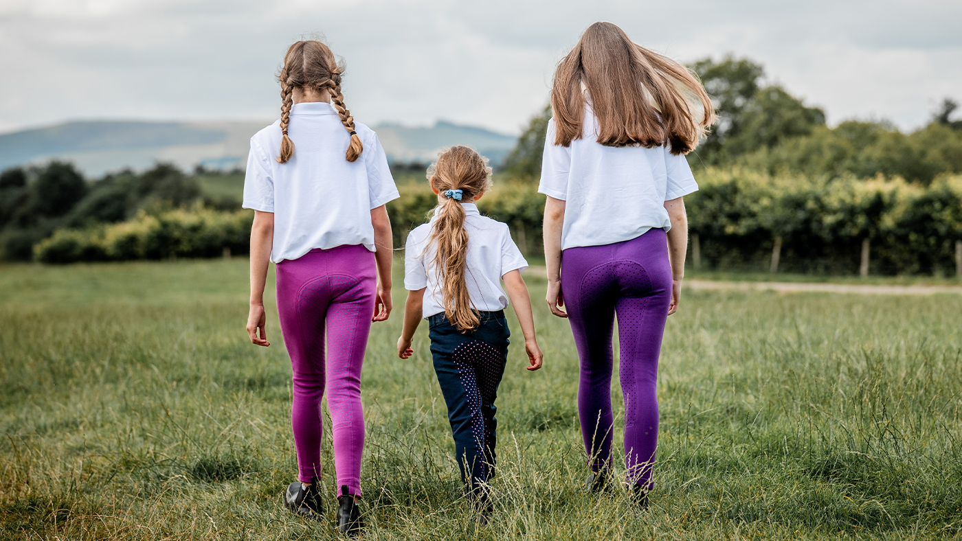 Children wearing horse riding jodhpurs