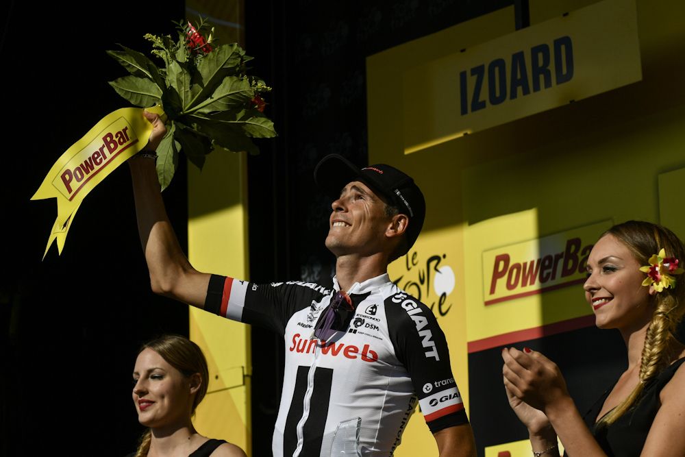 Warren Barguil on the Tour de France podium after winning stage 18