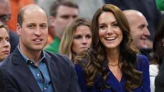 Prince William and Princess Kate smile together as they watch the NBA basketball game between the Boston Celtics and the Miami Heat at TD Garden on November 30, 2022 in Boston, Massachusetts