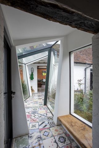 glass link extension to cottage with different angles