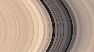 A true-color image of Saturn's B ring, the Cassini Division and part of the A ring. Note that the Cassini Division is not empty, but contains darker particles at reduced densities.