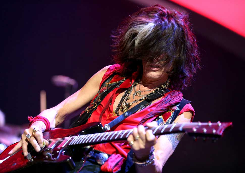 Guitarist Joe Perry of Aerosmith performs onstage during the 2012 iHeartRadio Music Festival at the MGM Grand Garden Arena on September 22, 2012