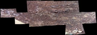 This enhanced-color image, captured by Opportunity in October 2017, of ground sloping downward to the right in Perseverance Valley shows textures that may be due to abrasion by wind-driven sand. 