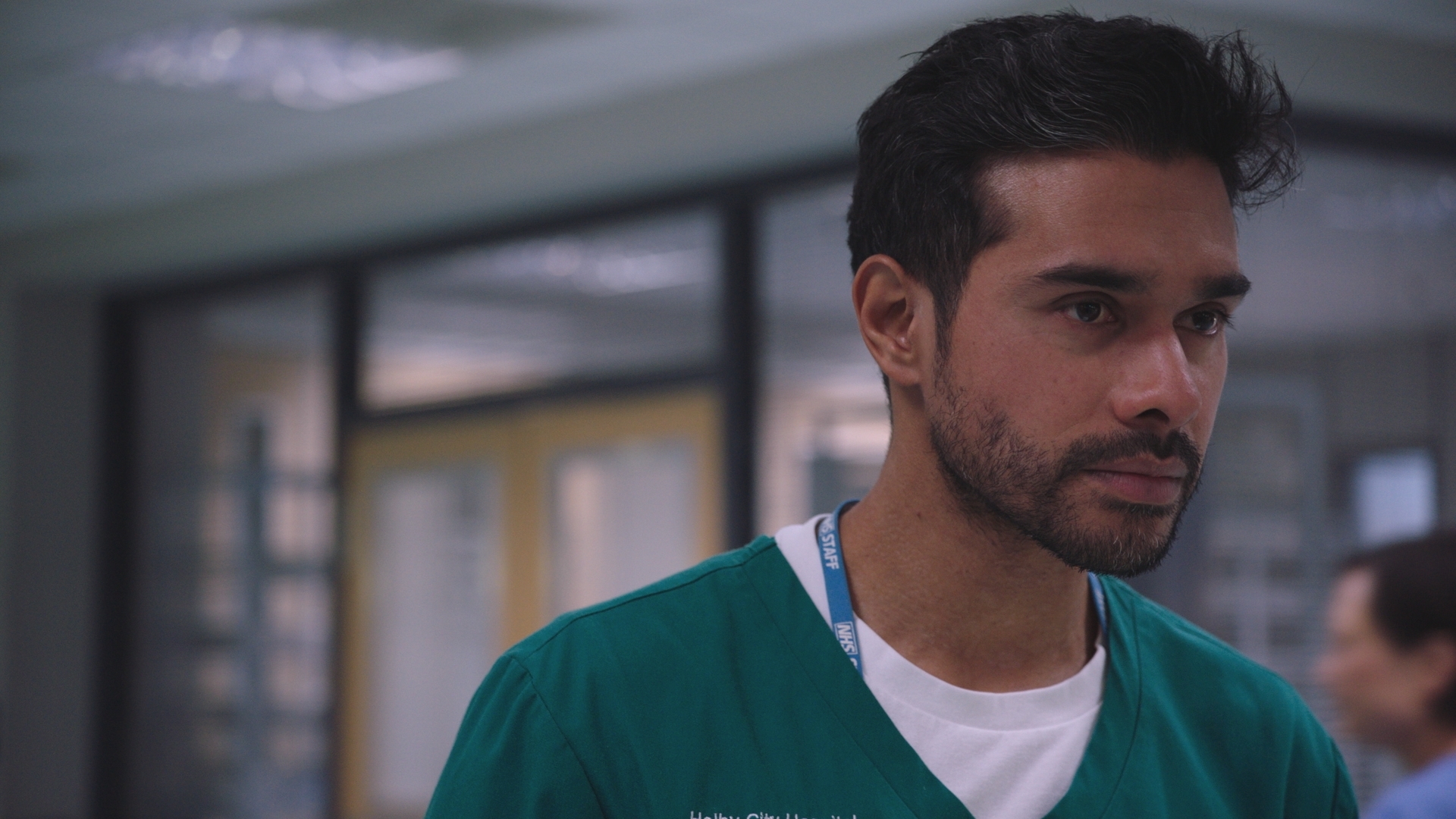 Rash Masum at work looking troubled.