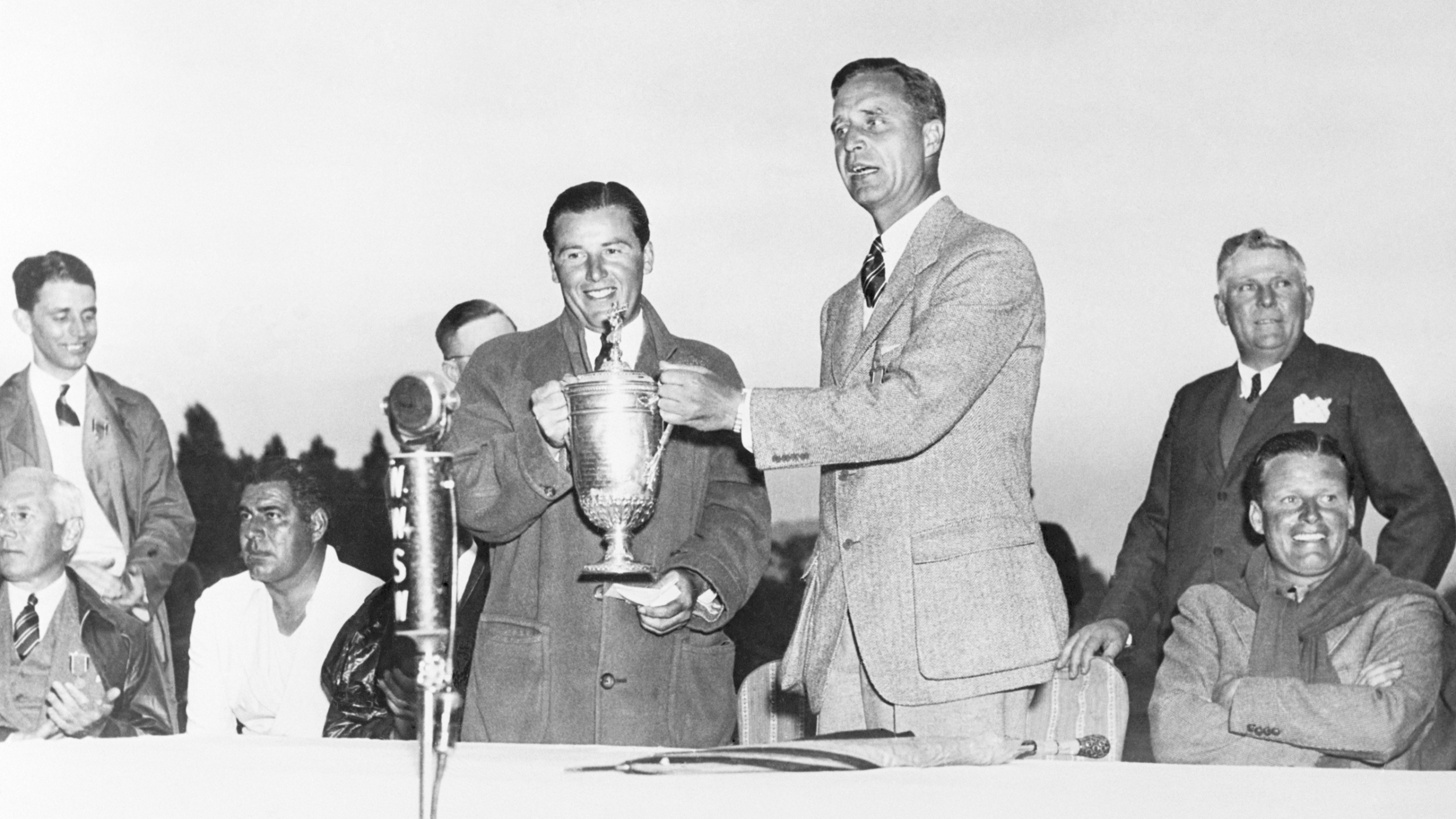 Sam Parks Jr is presented with the US Open trophy