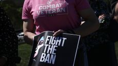 Protester fighting President Donald Trump's ban on transgender troops