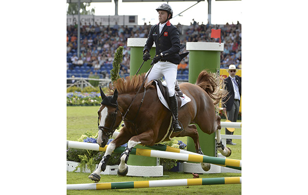 Ben MAHER (GBR) riding Diva II during the Second Qualifying Competition for the European Team Jumping competition at the FEI European Championships in Aachen, Germany on 20 August 2015 thrills and spills crash fence