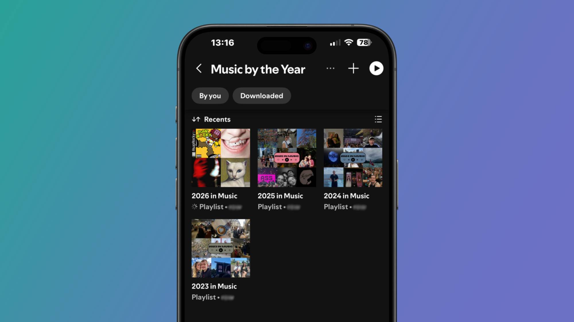 A smartphone showing four playlists in one folder in the Spotify app