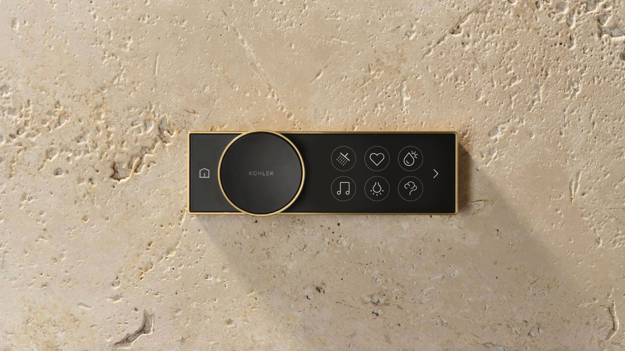 The Kohler Anthem controller on a bathroom wall