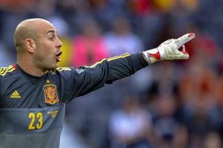 Pepe Reina shouts instructions in a friendly for Spain against South Korea ahead of Euro 2012.