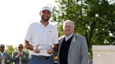 Scottie Scheffler poses with the Memorial Tournament trophy alongside host, Jack Nicklaus