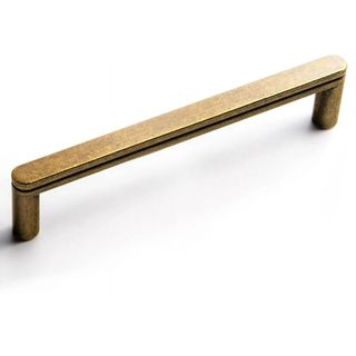 A brushed brass pull