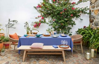 Levantine collection from John Lewis with garden table and dinnerware on patio