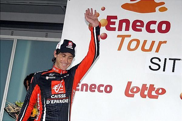 A big smile and a wave from the Eneco Tour leader Jose Ivan Gutierrez.