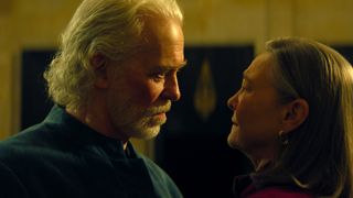 an elderly man confronts an older woman