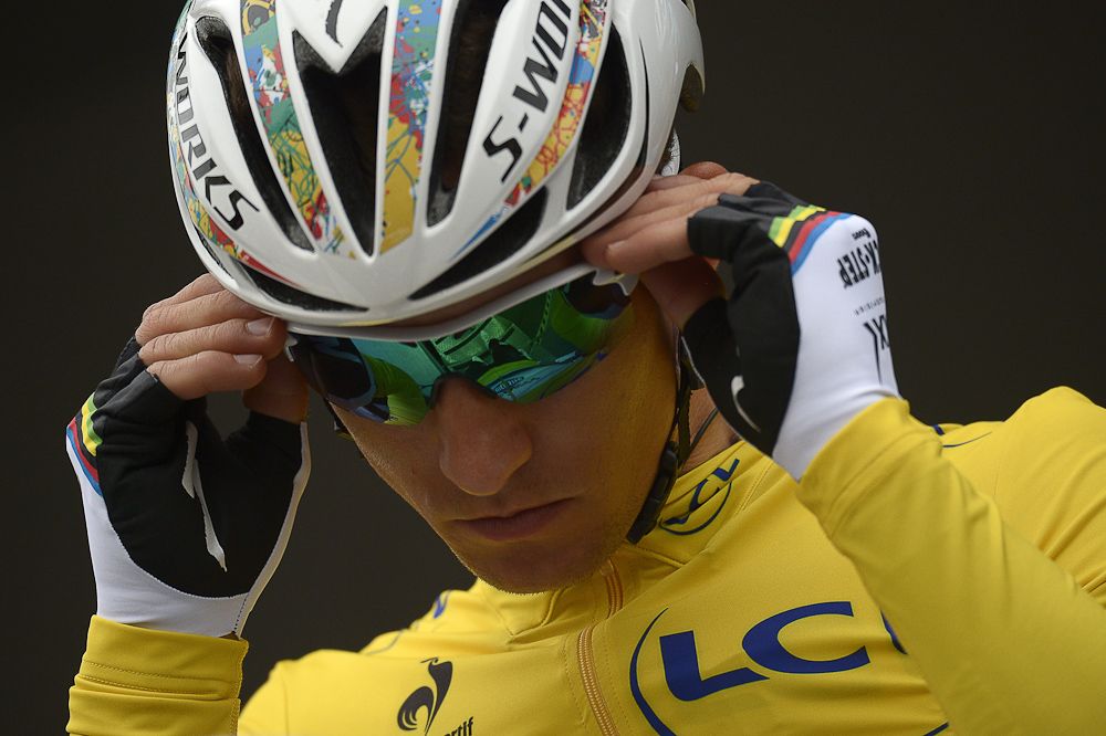 Poland's Michal Kwiatkowski, wearing the overall leader's yellow jersey, is pictured during the signature ceremony ahead of the start of the first stage of the 73rd edition of the Paris-Nice.