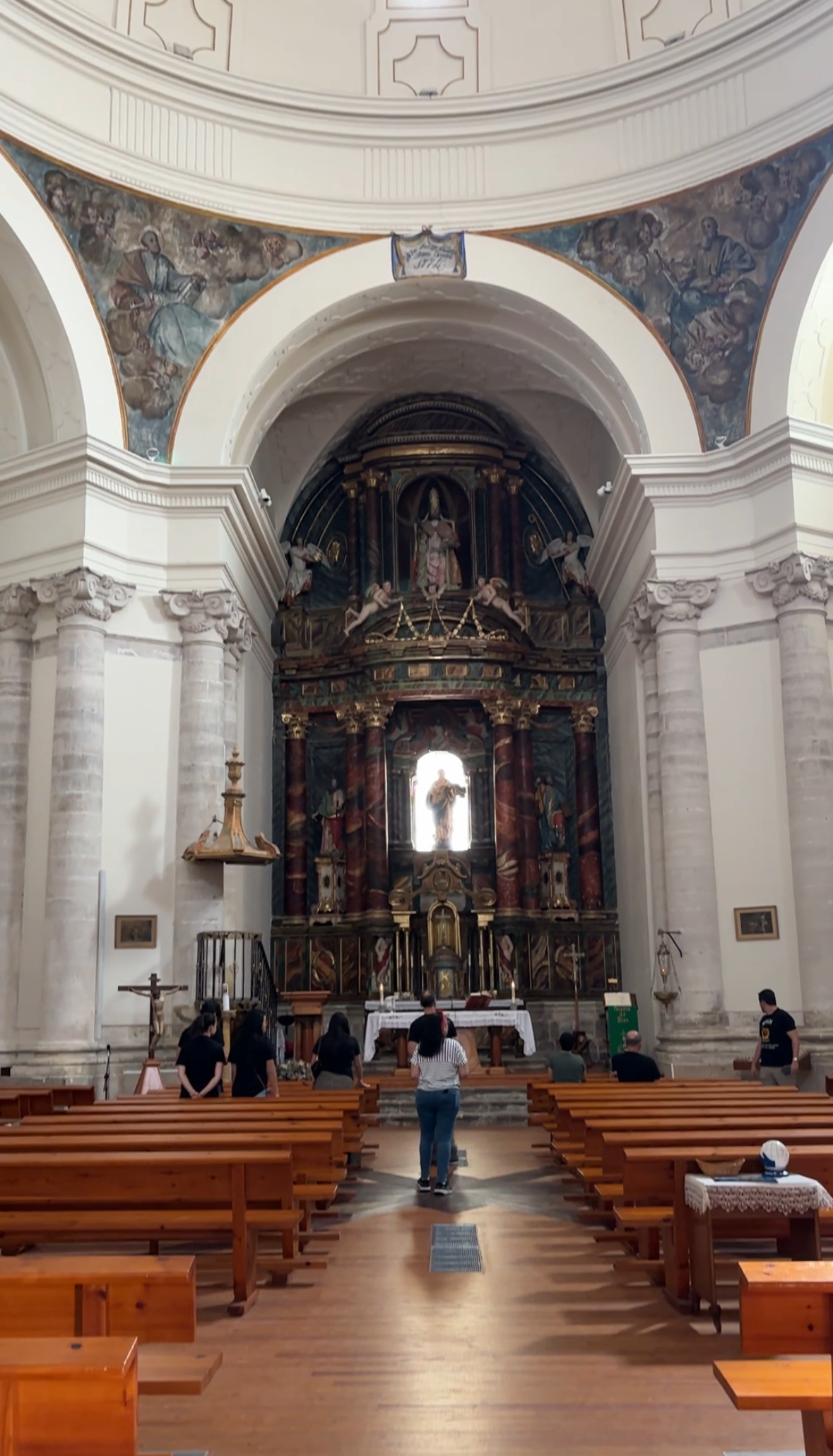 The interior of a Catholic church.
