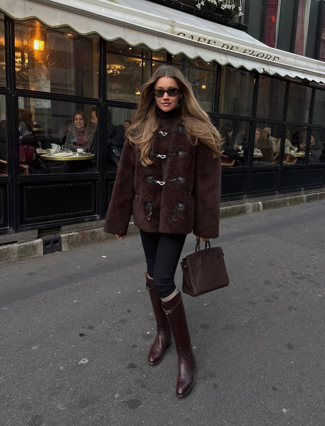 woman wearing leggings with boots outfit 2026