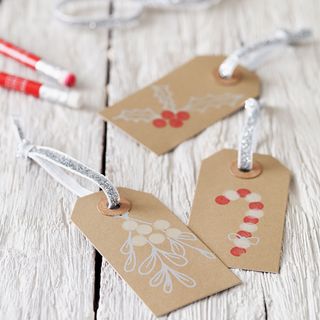 Christmas gift tags with stencilled designs